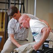 physical-medicine-helping-man-in-wheelchair-_S3B9092-square