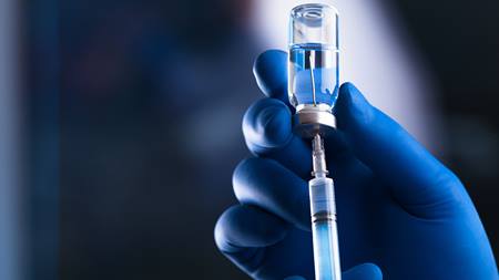 Vaccine booster shot sized for Caregiver News