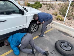 Tire change in progress ready for Caregiver News