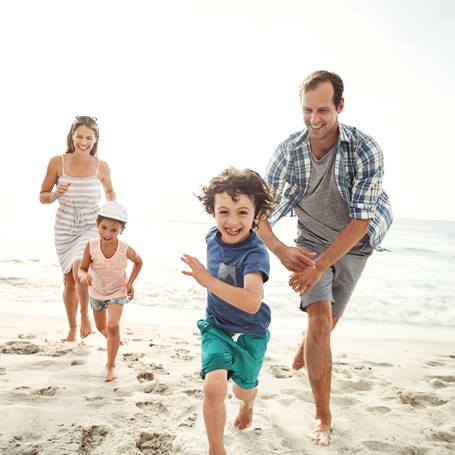 family on beach running_square