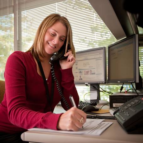 female-office-worker-talking-on-phone
