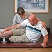 physical-medicine-man-stretching-_S3B9123-square