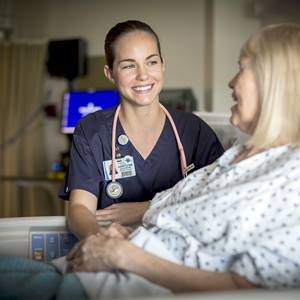 nurse-smiling-female-patient-support