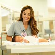 nursing-assistant-with-newborn