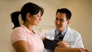 diabetes-and-endocrinology-doctor-checking-blood-pressure-WO8I3902-landscape
