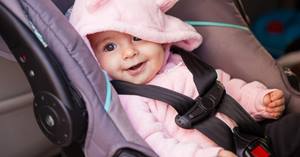 Can my child wear a coat in their car seat