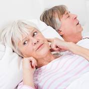 Woman-Disturbed-With-Man-Snoring