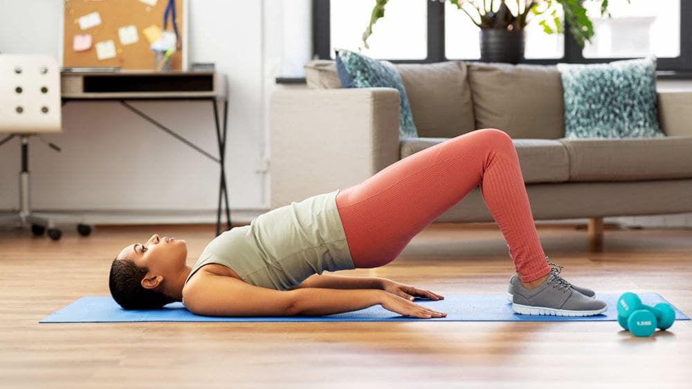 Woman doing Pilates at home