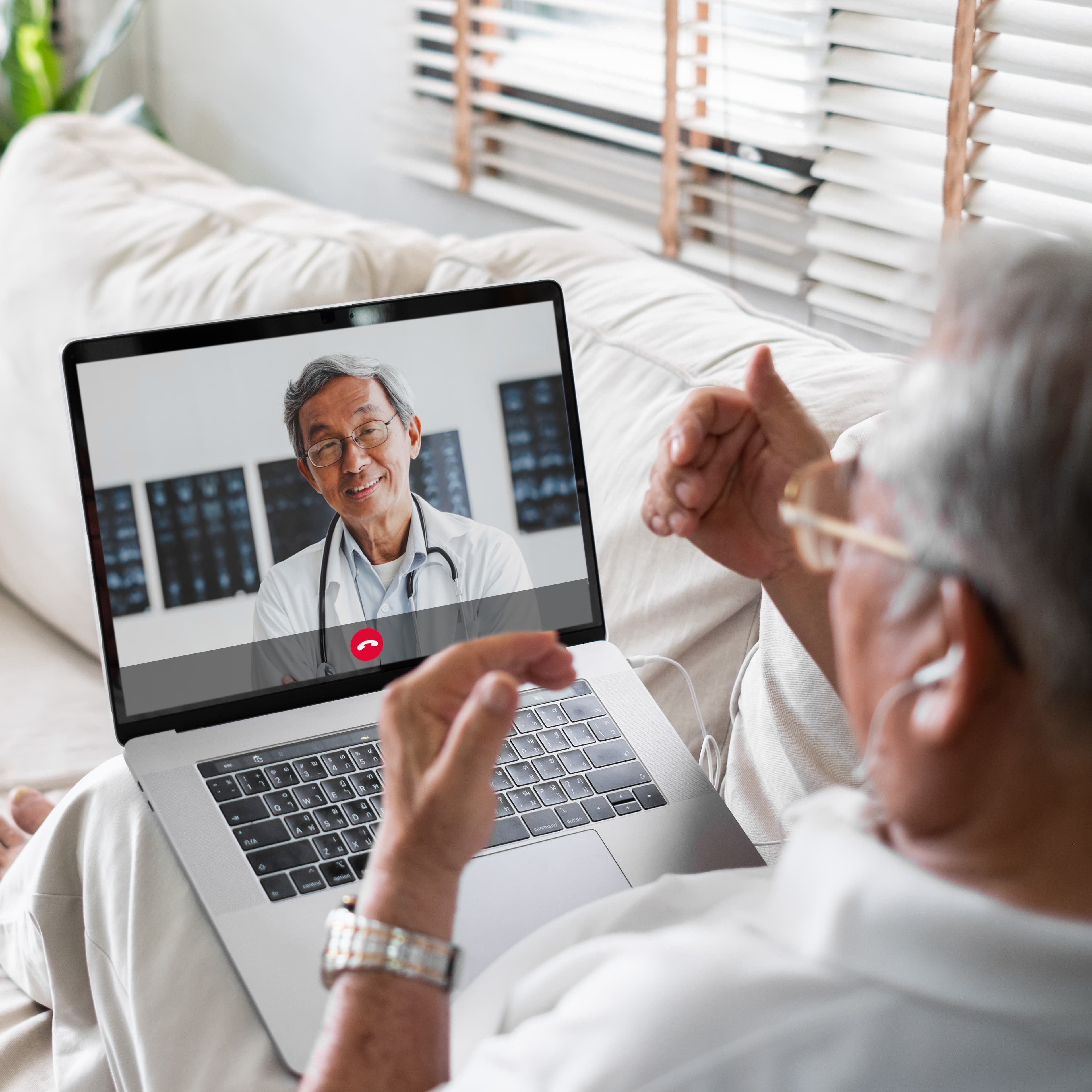 patient on video call with doctor