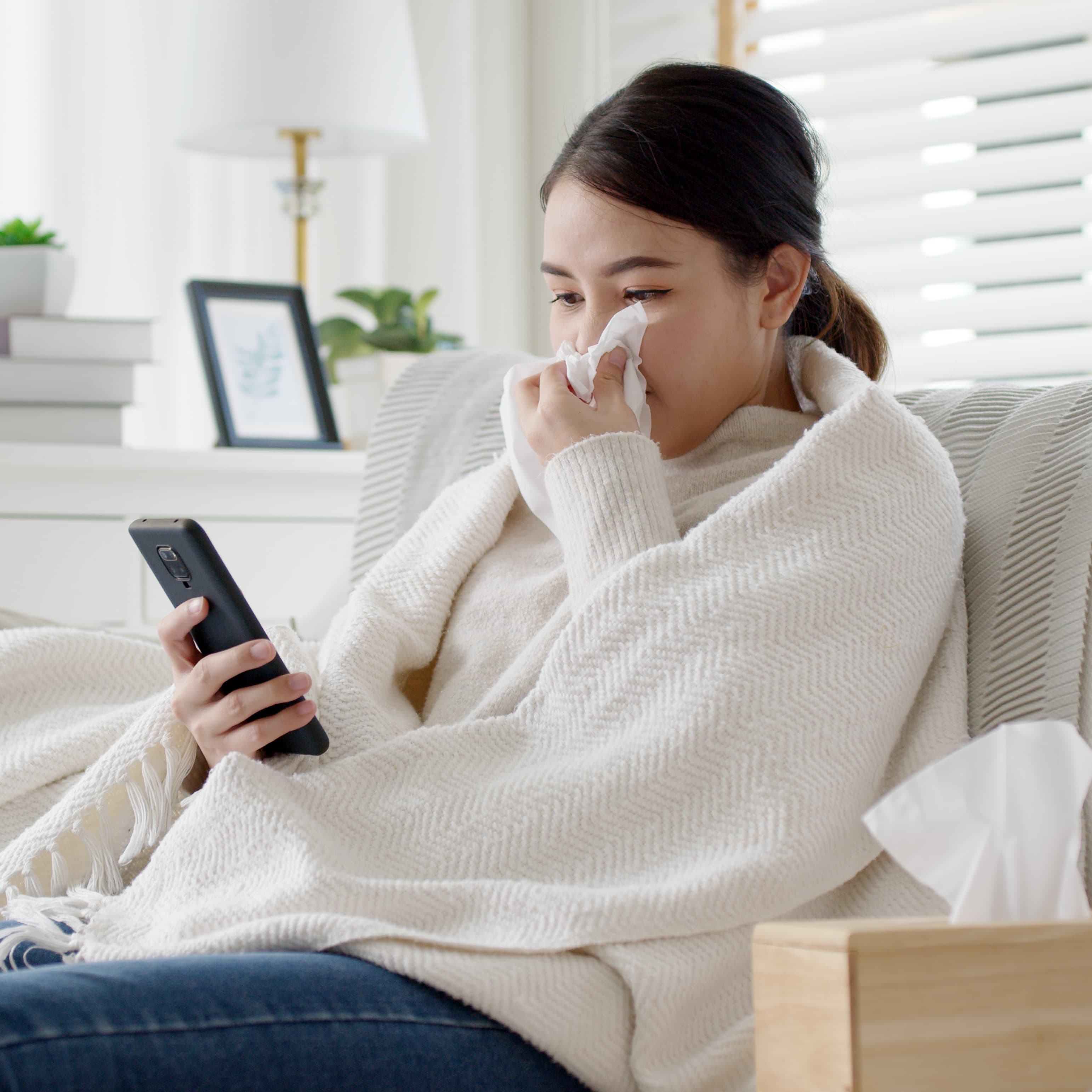 woman with cold on video call