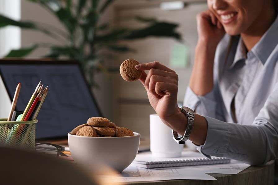 Person snacking while working at home