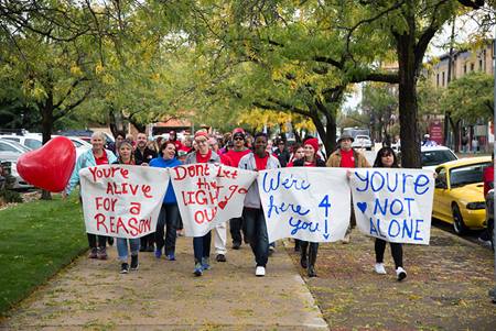 Hope Squad Students holding hopeful signs at the 2016 NUHOPE Walk