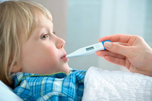 At what temperature should a child's fever be considered dangerous?